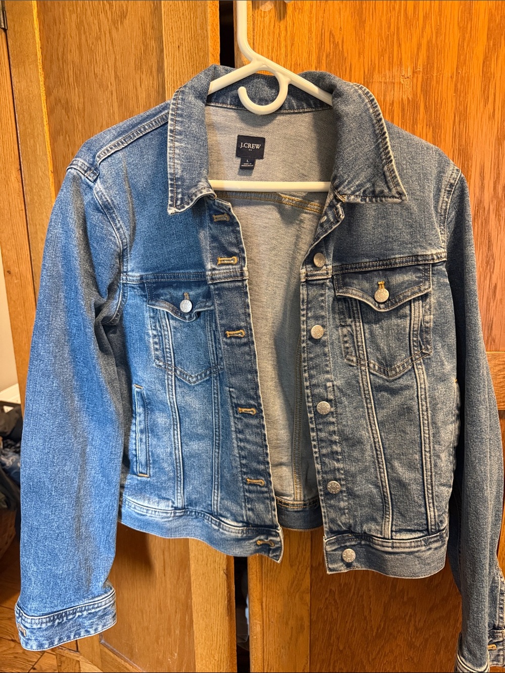 J Crew jean jacket large size  medium weight denim. Medium blue. All intact